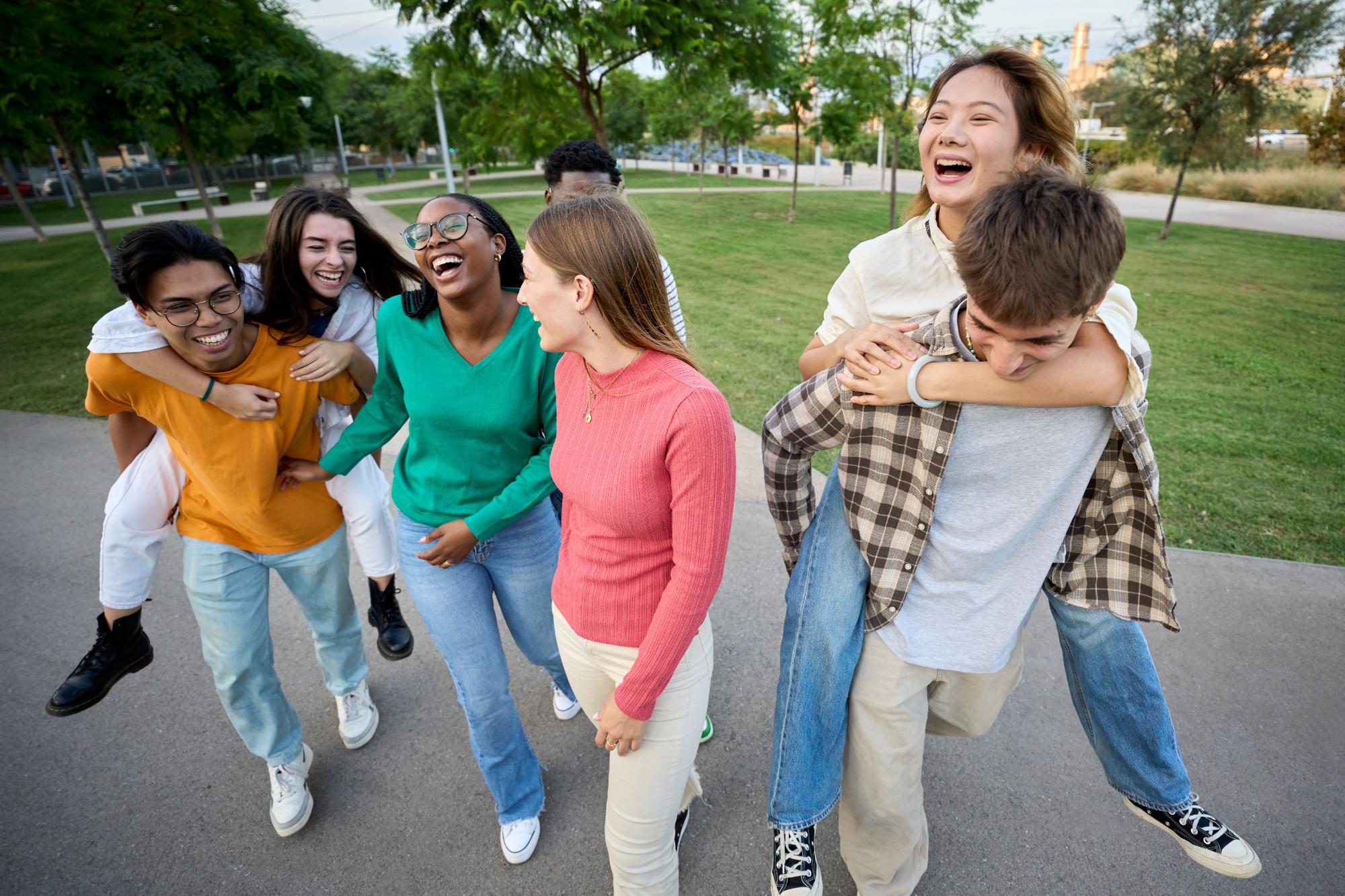 a-large-multiracial-group-of-teenagers-laughing-an-2025-01-08-04-43-53-utc